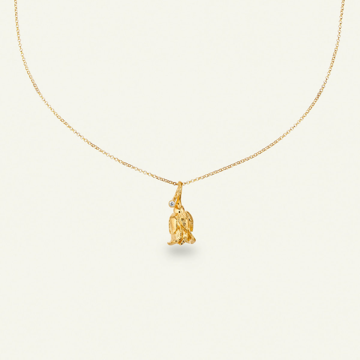 Rose halskjede med anheng og diamant, forgylt