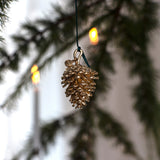 Furukongle, 18 karat gullbelagt